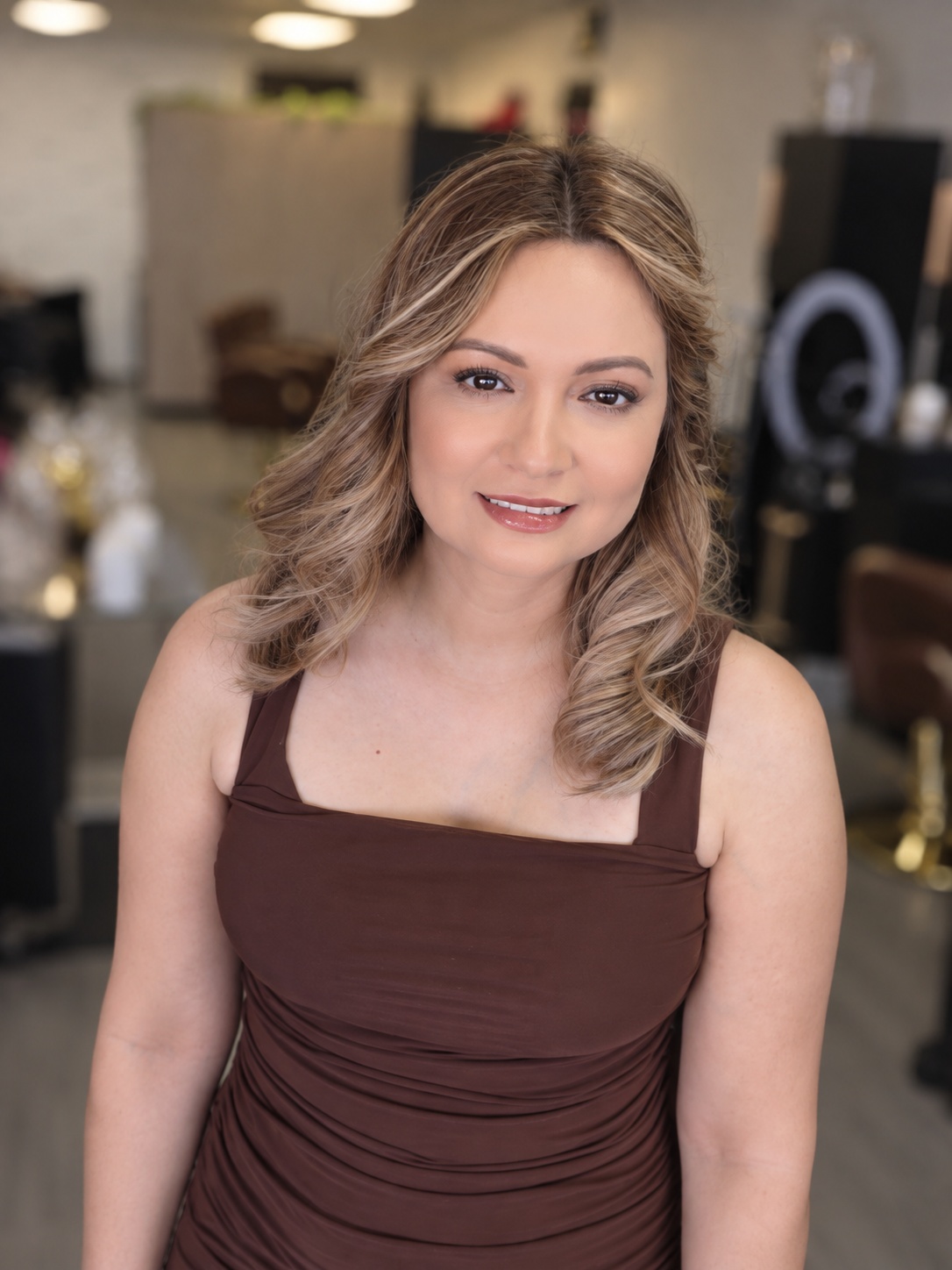 Portrait of Flor, founder and cosmetologist of GMS Beauty Salon in Madera, California